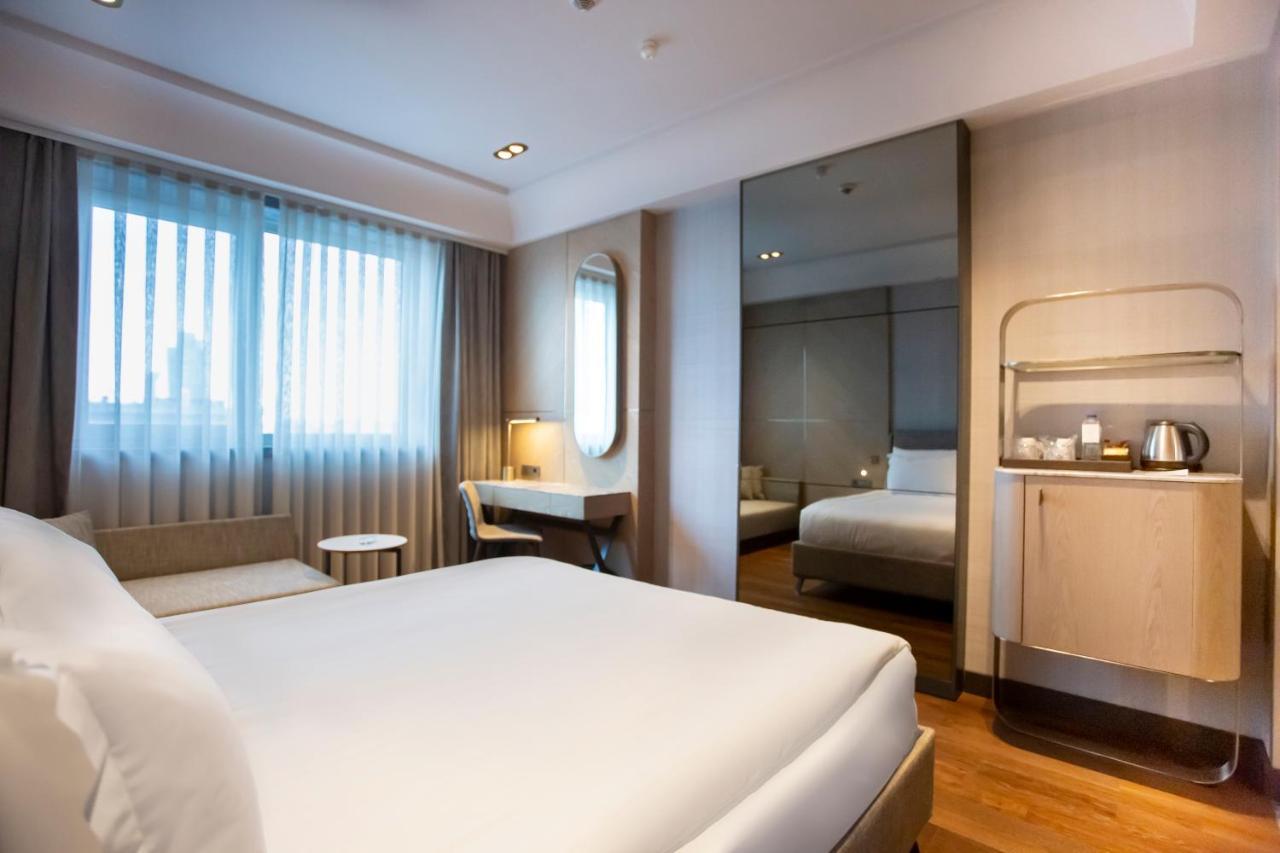 Chambre Lit Queen-Size Deluxe